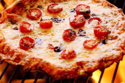 Cómo cocinar pizza a la parrilla